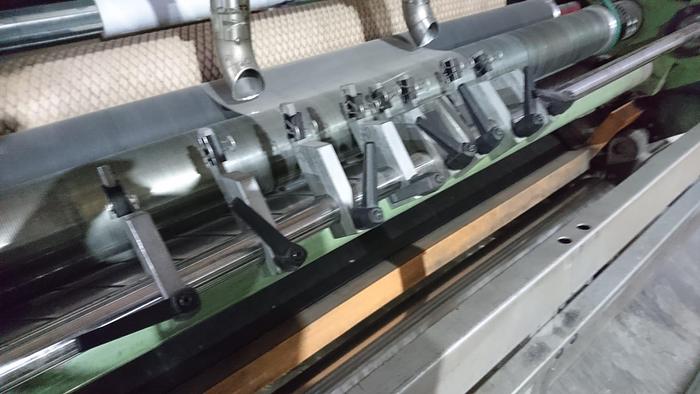 Used TECNICOL SLITTER- Non Stop two-shaft revolver turreting