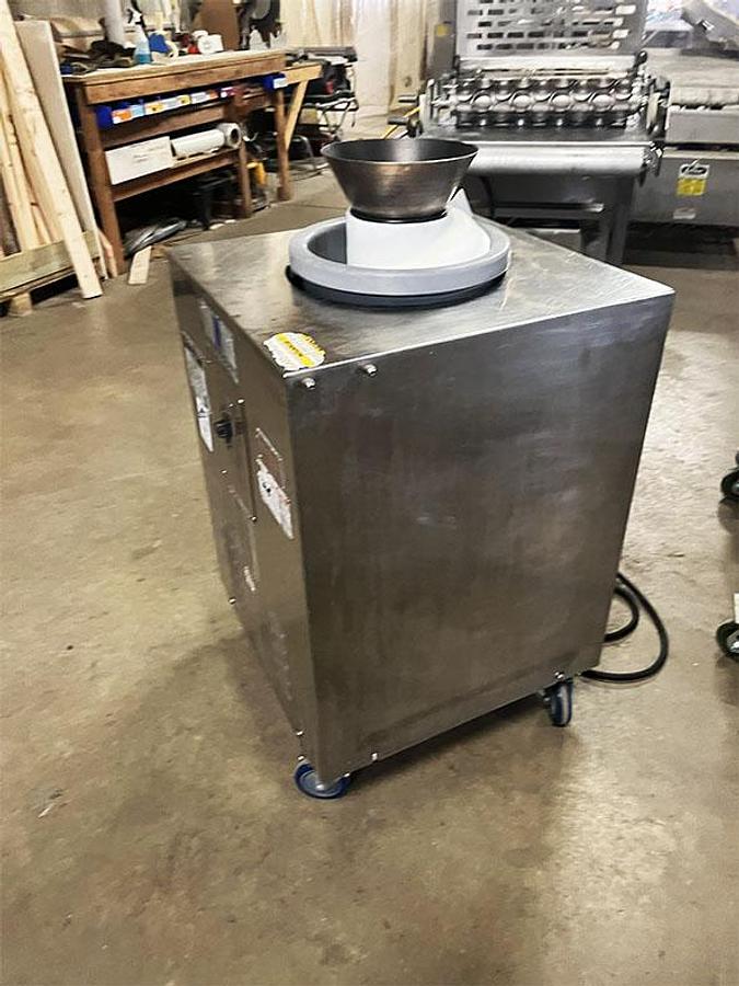 Refurbished AM Manufacturing Round-o-matic