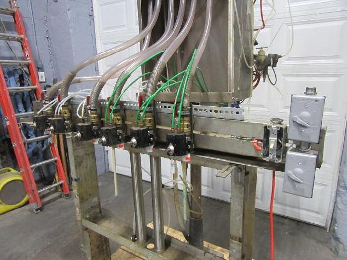 Used 6 SPOUT ELS GRAVITY FILLER