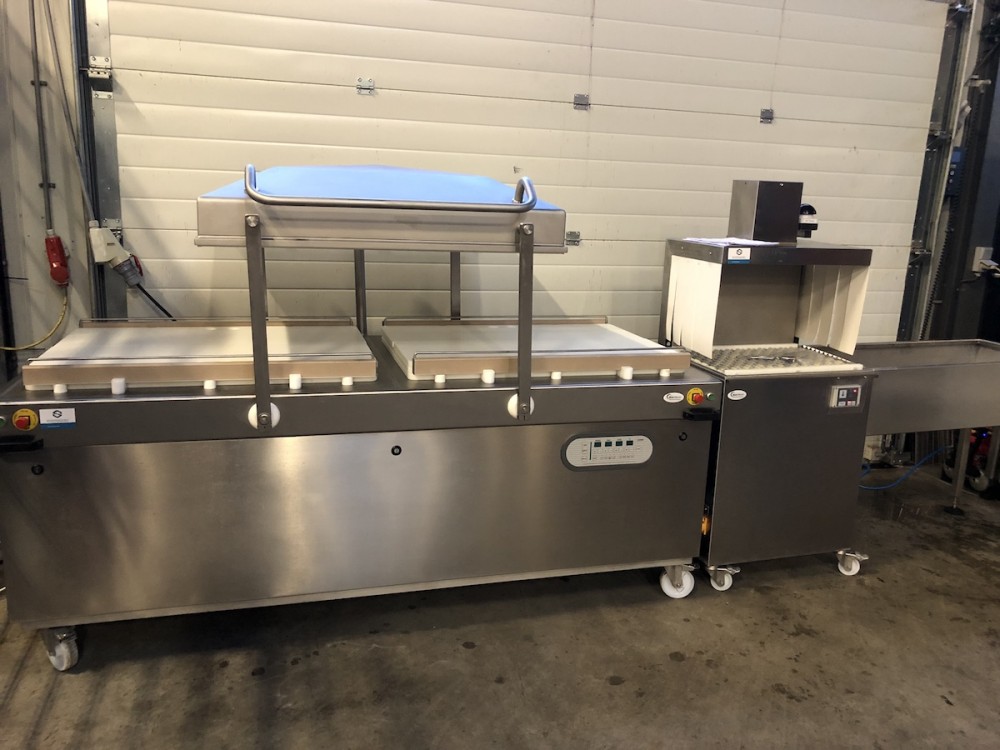 Used Boss double chamber vacuum machine