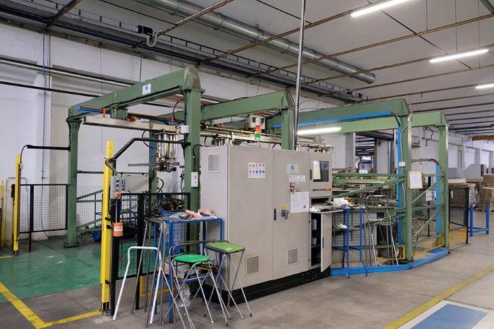 Ricondizionato Macchine curvatubi a due teste a CNC a cinque assi con carico e scarico automatico  Two-head CNC tube bending machines with five axes with automatic loading  Fünfachsige CNC-Rohrbiegemaschinen mit zwei Köpfen mit automatisches Beladen  Cintreuses de tubes CNC à cinq axes à deux têtes avec chargement automatique