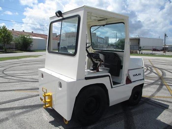 Used 1999 Harlan HTAG50 with Cab, baggage tow tractor. Power Steering.