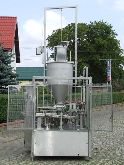 D'occasion Distributeur carrousel à 2 pistons et 2 rangées pour emballages en plastique et aluminium avec soudure de couvercles, "Grunwald"