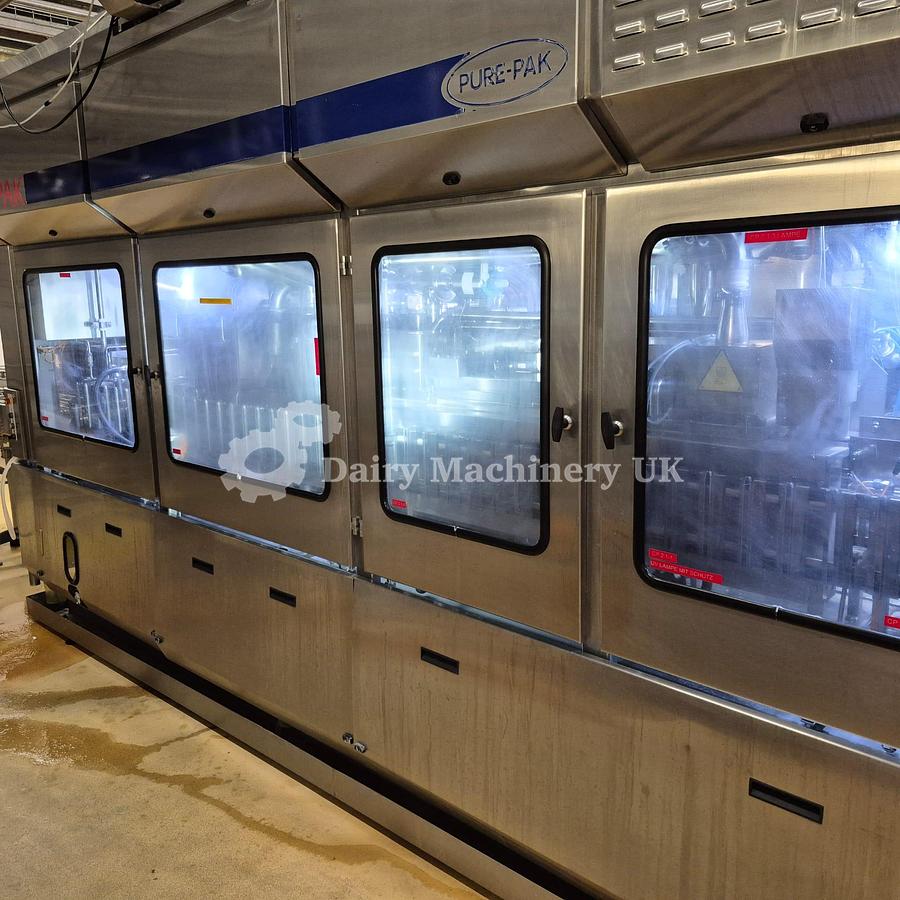 Used ELOPAK PURE PAK GABLE TOP FILLER WITH WRAP AROUND CARDBOARD PACKER