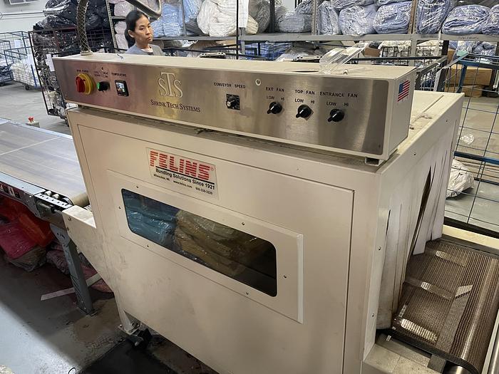 Used Felins Shrinktech L-Sealer with conveyors