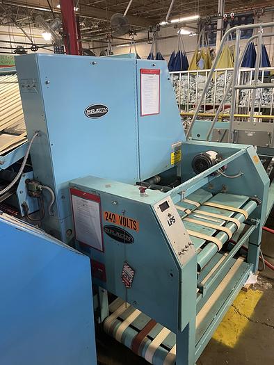 Used 2007 Braun sheet folder with stacker