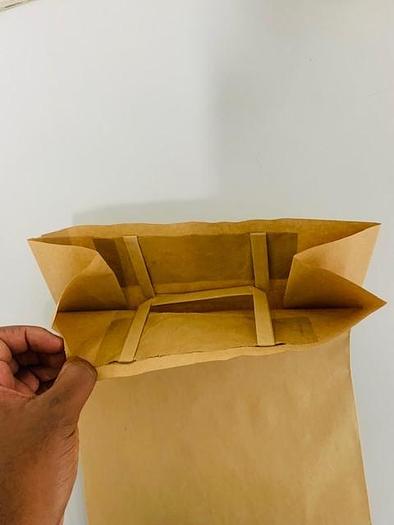 Used (visible in production) NEWLONG 117T+ 506TH - Reel Fed paper bag machine with Flat handles unit