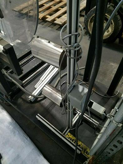 Used Rapid Motorized Double Sided Stock Reel Material Feed with control panel