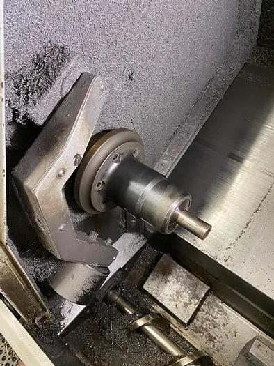 Used 2007 Haas CNC Lathe SL-10T & Servo Bar 300 Feeder