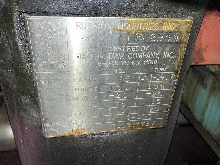 Used Used Rubicon Industries vertical approximately 100 square foot 304 stainless steel shell and tube Heat Exchanger