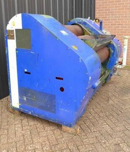 Used three-roll refiner