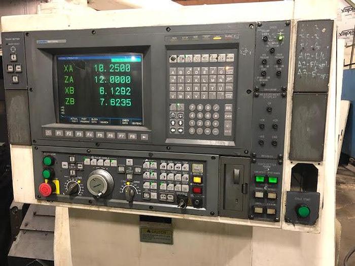 Used 1996 OKUMA LU15 CNC Lathe, Twin Turret, Tailstock, OSP 7000L Control