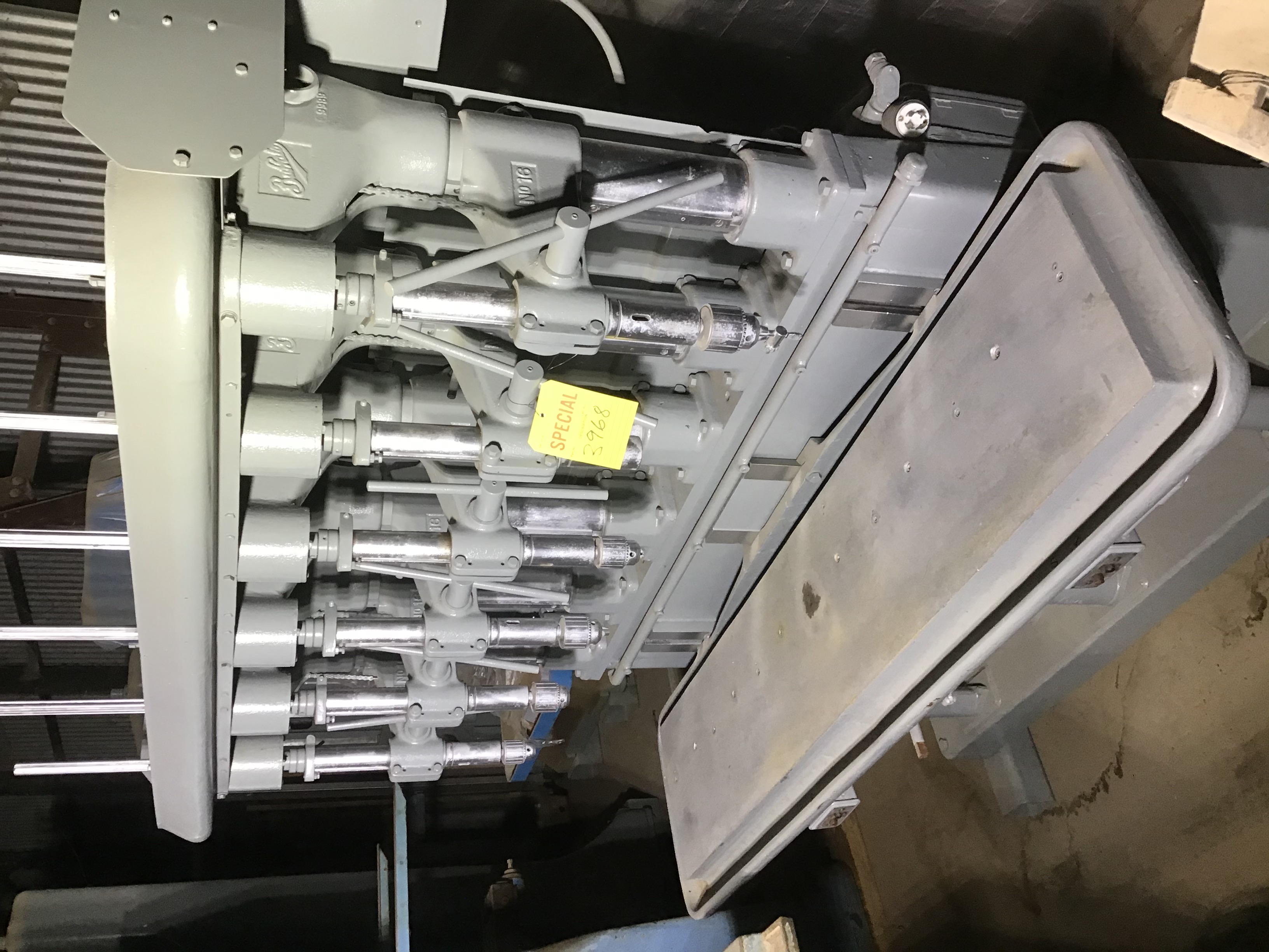 Used 6 Spindle Buffalo Production Drill; #2 MT; 14” x 66” Tbl;