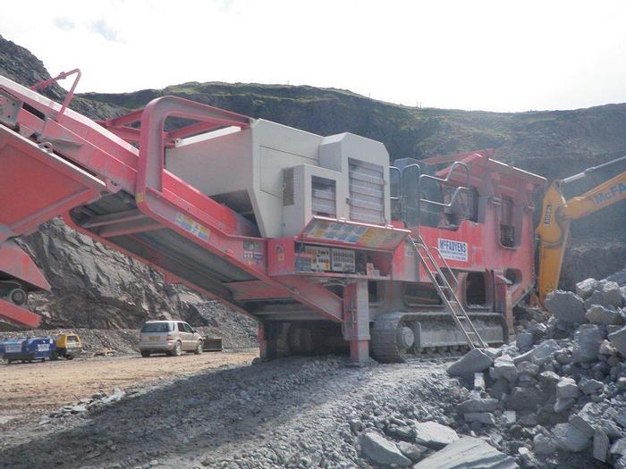 Used Sandvik QJ 240 tracked jaw crusher