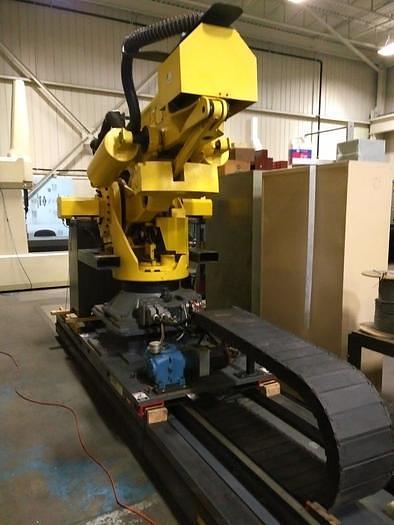Used 2012 FANUC  M900iB/700 6 AXIS CNC ROBOT WITH R30iB CONTROLLER  & 7TH AXIS 15' LONG TRACK.