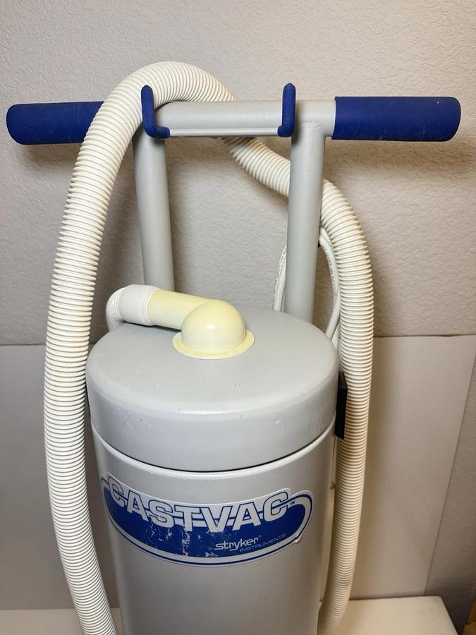 Used Stryker CastVac Vacuum Model: 986 w/ Mobile Stand on Wheels