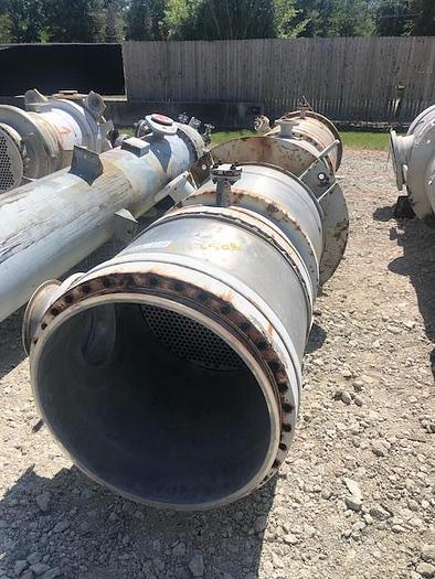 Used Used Melter approximately 1004 sq. ft. vertical 316L stainless steel shell and tube heat exchanger