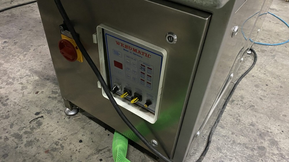 Used Webomatic vacuum line