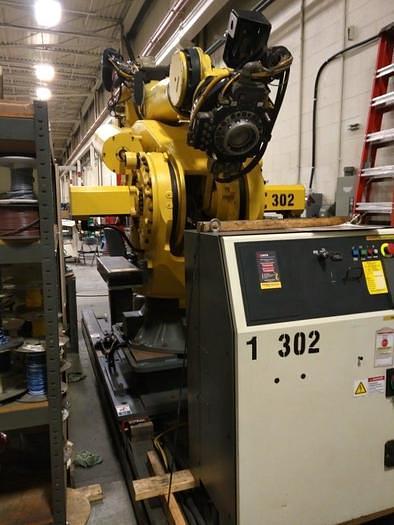 Used 2012 FANUC  M900iB/700 6 AXIS CNC ROBOT WITH R30iB CONTROLLER  & 7TH AXIS 15' LONG TRACK.