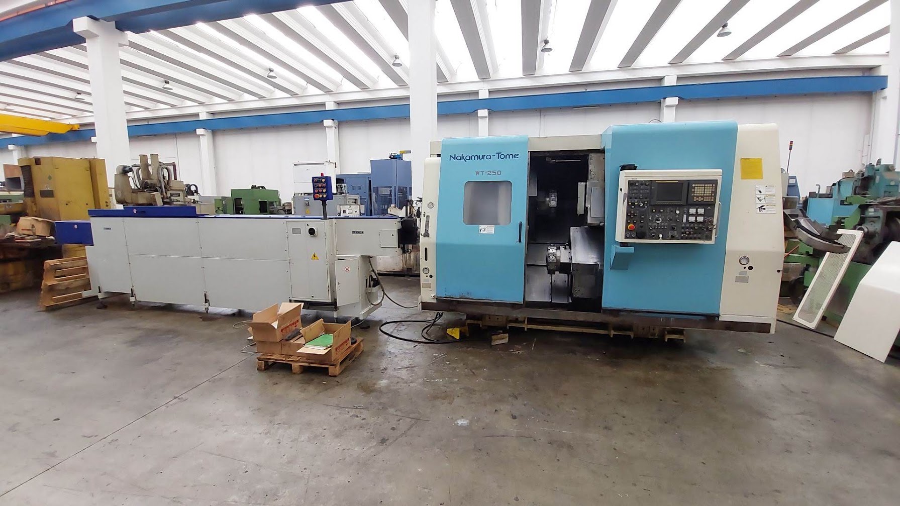 Used NAKAMURA WT250 - 4 axis + Y axis