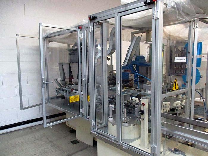 Used Senzani Flip Top Cartonner for candy