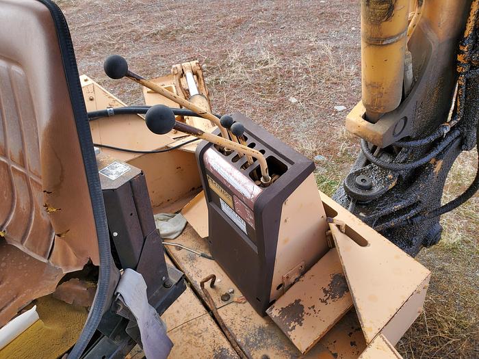 Used Case 580SE Backhoe w/ Attachments