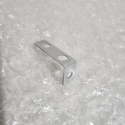 Used BRACKET SHROUD BOTTEM BACK SIDE LOAD LOCK M00001625