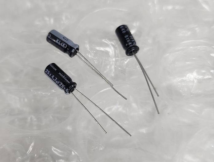 Used NICHICON (VA) 493-11528-1-ND CA ALUM 100UF & NICHICON 483-571-ND CAP ALUM 4.7UF