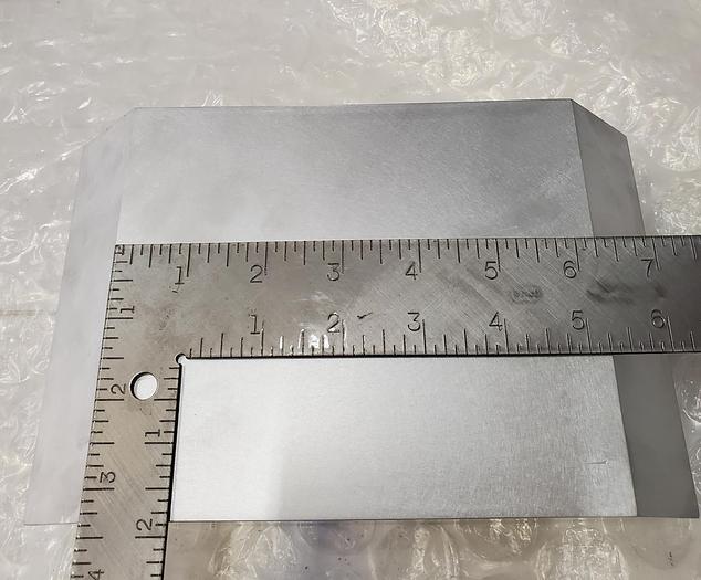 Used APPLIED MATERIALS ALUMINUM FILLER BLOCK BASE 20-00-07285-001/2