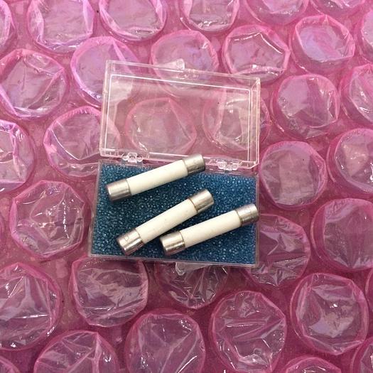Used 1-1-2 A 250V 313 FUSES AND 3 250V BUSS MDA