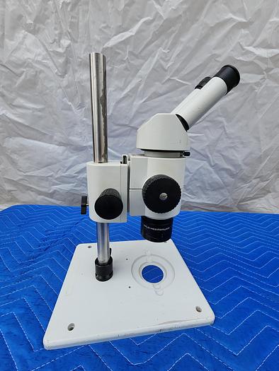 Used WILD HEERBRUGG MICROSCOPE WITH 2 EYEPIECES WF10X22