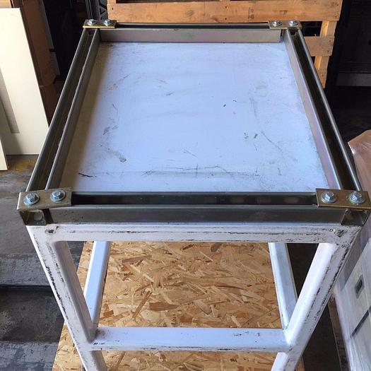 Used Heavy duty steel frame work tables with adjustable feet.