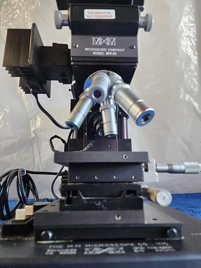 Used THE MM MICROSCOPE INC WM40 OBJECTIVES BAUCH AND LOMB 25X 0.31 NA, 50X 0 45 NA, 2.25X 0.04 NA, 8X