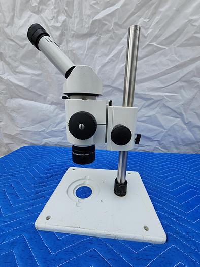 Used WILD HEERBRUGG MICROSCOPE WITH 2 EYEPIECES WF10X22