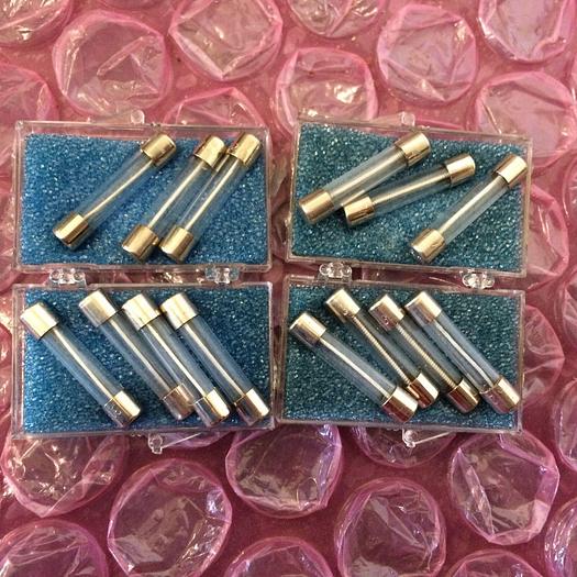 Used 1-1-2 A 250V 313 FUSES AND 3 250V BUSS MDA