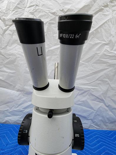 Used WILD HEERBRUGG MICROSCOPE WITH 2 EYEPIECES WF10X22