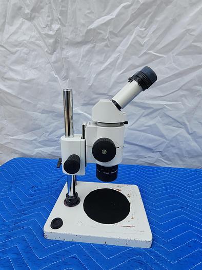Used WILD HEERBRUGG MICROSCOPE WITH PLAN 1X (2 EYEPIECES LEICA 10X21B)