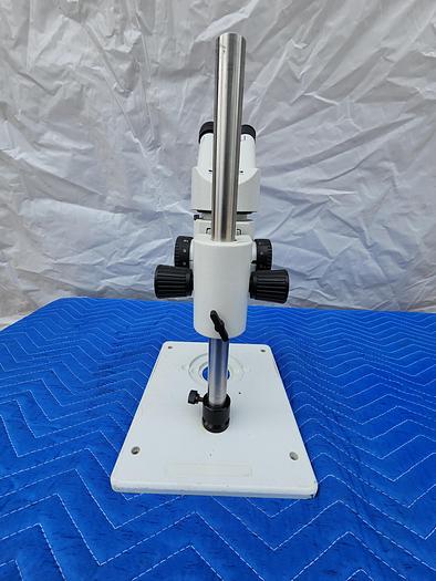 Used WILD HEERBRUGG MICROSCOPE WITH 2 EYEPIECES WF10X22