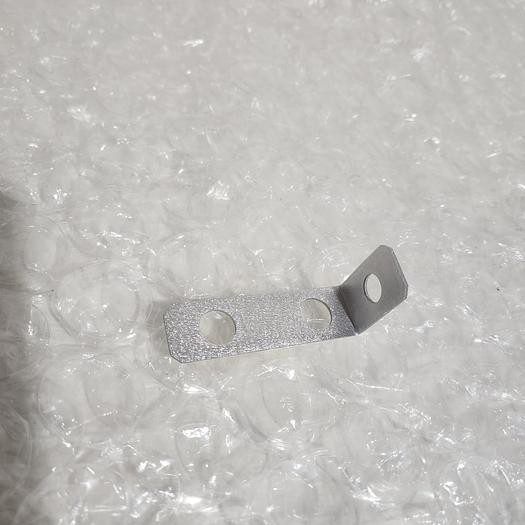 Used BRACKET SHROUD BOTTEM BACK SIDE LOAD LOCK M00001625