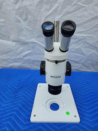 Used WILD HEERBRUGG MICROSCOPE WITH 2 EYEPIECES WF10X22