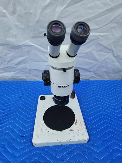 Used WILD HEERBRUGG MICROSCOPE WITH PLAN 1X (2 EYEPIECES LEICA 10X21B)