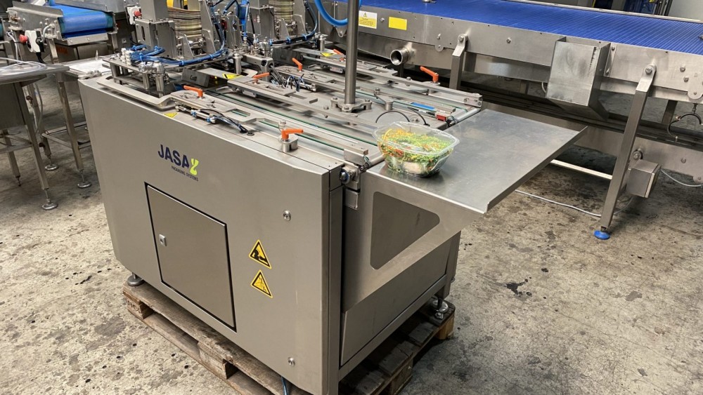 Used Fully automatic twin lane Jasa sleever, brand new