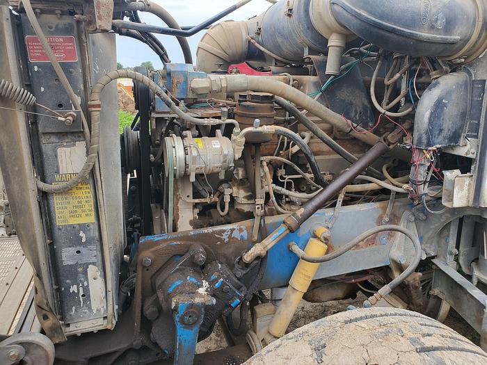 Used 1990 Peterbilt w/ New Holland 1051 Stack Retriever