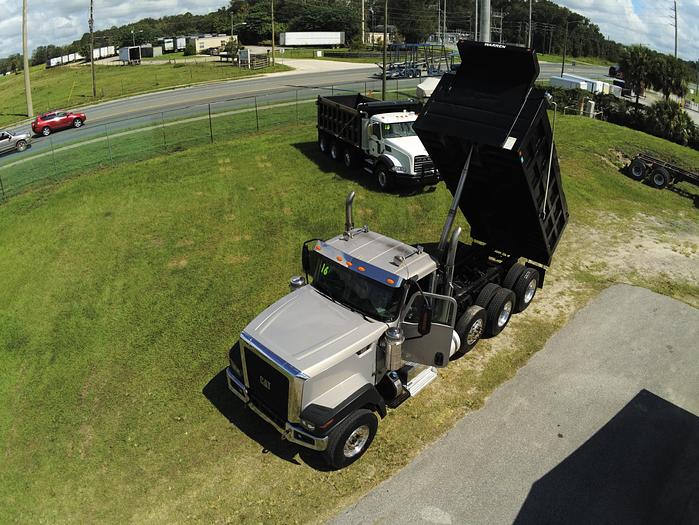 Used 2016 CATERPILLAR FACTORY DUMP TRUCK