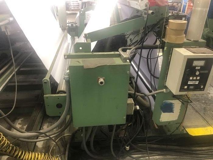 Used 72" WIDE REM CENTER SURFACE DUPLEX SLITTER REWINDER