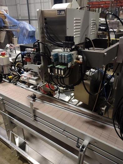 Used Used LSI Pressure Sensitive Labeler model 1300S with Zebra Print and Apply model 170PAX4.