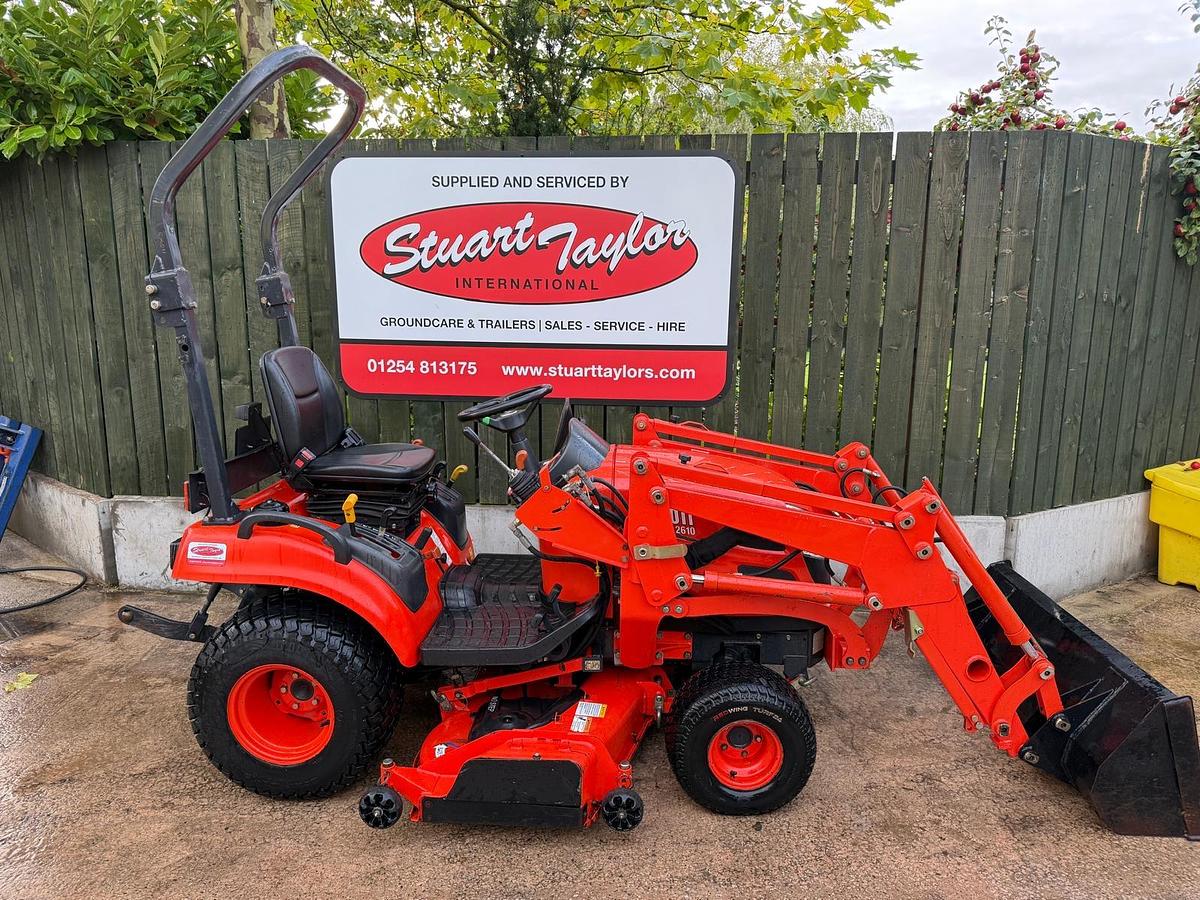 Used Kioti CS 2610 HST ROPS Compact Tractor with loader and bucket