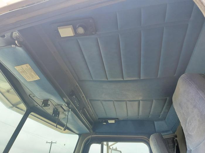 Used 1990 Peterbilt w/ New Holland 1051 Stack Retriever