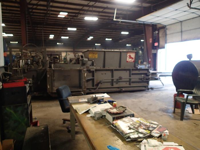 Used LOGEMANN TWO RAM BALER MODEL 245AT1; 50 HP; 9" CYLINDER