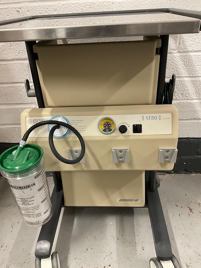 Used Eschmann 4 bottle suction trolley ST80